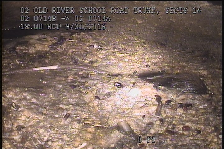 Deposits Settled Other, 60 %of cross sectional area, from 03 to 09 o'clock, , within 8 inches of joint: NO - SLUDGE