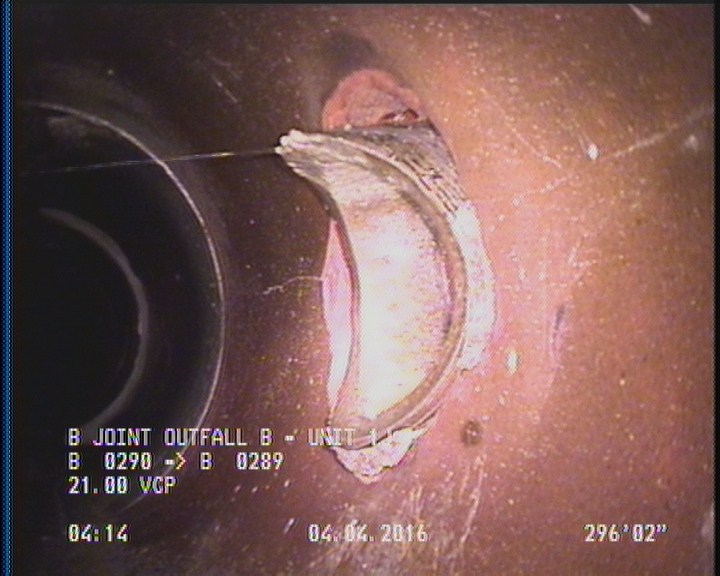 Tap Break-In Intruding, at 12 o'clock, -, #v, within 8 inches of joint: NO, 6", 2"