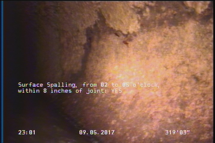 Surface Spalling, from 02 to 05 o'clock, within 8 inches of joint: YES