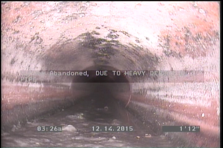 Survey Abandoned - DUE TO HEAVY DEBRIS IN PIPE