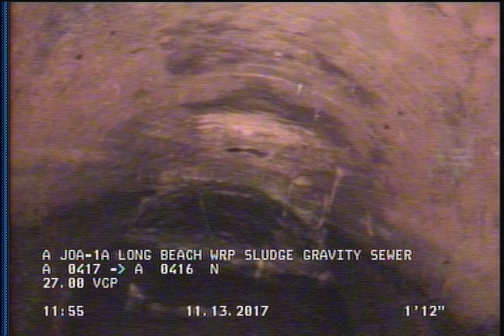 Deposits Attached Encrustation, 5 %of cross sectional area, from 09 to 03 o'clock, , within 8 inches of joint: YES