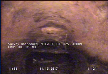 Survey Abandoned - VIEW OF THE D/S SIPHON FROM THE U/S MH