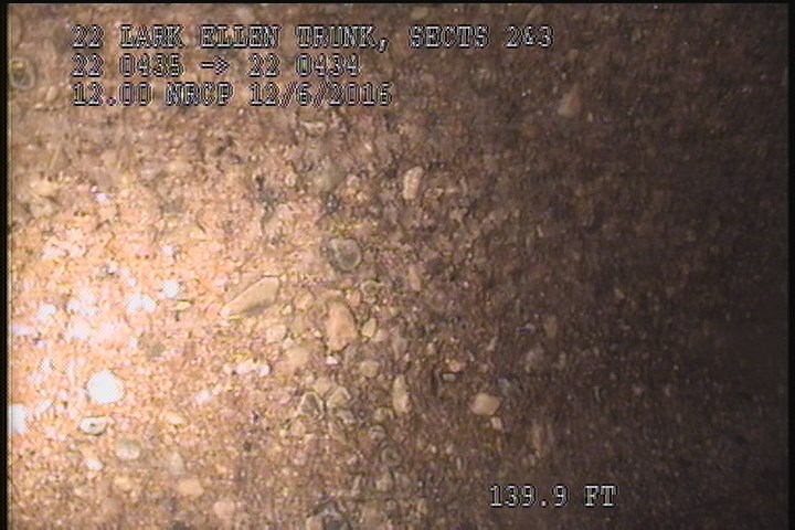 Surface Aggregate Projecting, from 09 to 03 o'clock, within 8 inches of joint: YES - SEVERE AGG