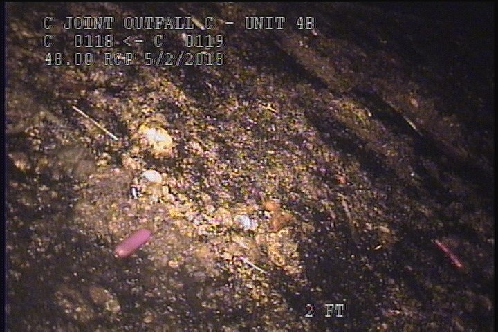 Deposits Settled Other, 20 %of cross sectional area, from 04 to 08 o'clock, , within 8 inches of joint: YES - SLUDGE