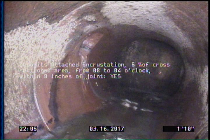 Deposits Attached Encrustation, 5 %of cross sectional area, from 08 to 04 o'clock, , within 8 inches of joint: YES