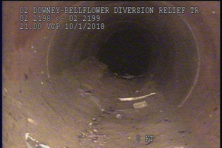 Deposits Settled Other, 15 %of cross sectional area, from 05 to 07 o'clock, , within 8 inches of joint: YES - SLUDGE