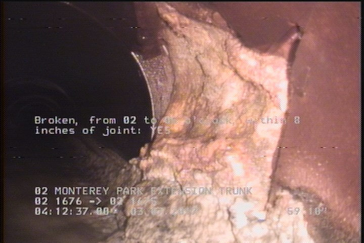Broken, from 02 to 05 o'clock, within 8 inches of joint: YES