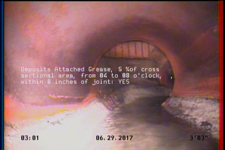 Deposits Attached Grease, 5 %of cross sectional area, from 04 to 08 o'clock, , within 8 inches of joint: YES