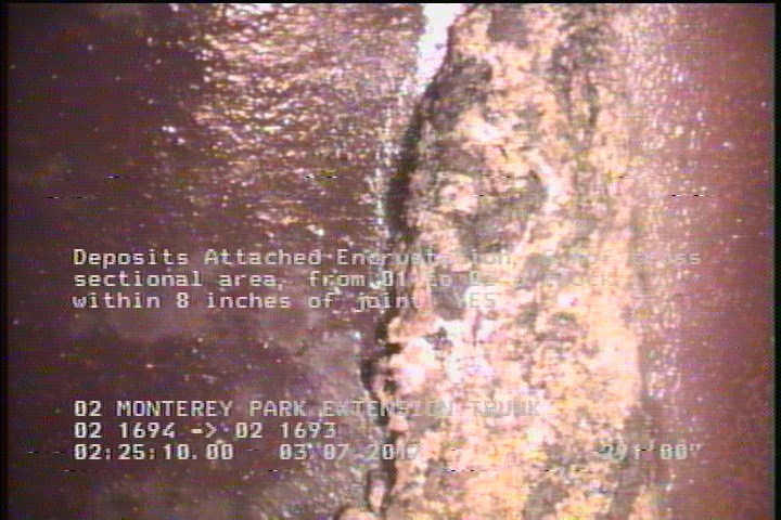 Deposits Attached Encrustation, 5 %of cross sectional area, from 01 to 03 o'clock, , within 8 inches of joint: YES