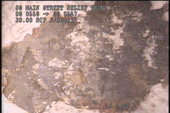 Surface Spalling, from 11 to 01 o'clock, within 8 inches of joint: NO - FLAKING CONCRETE