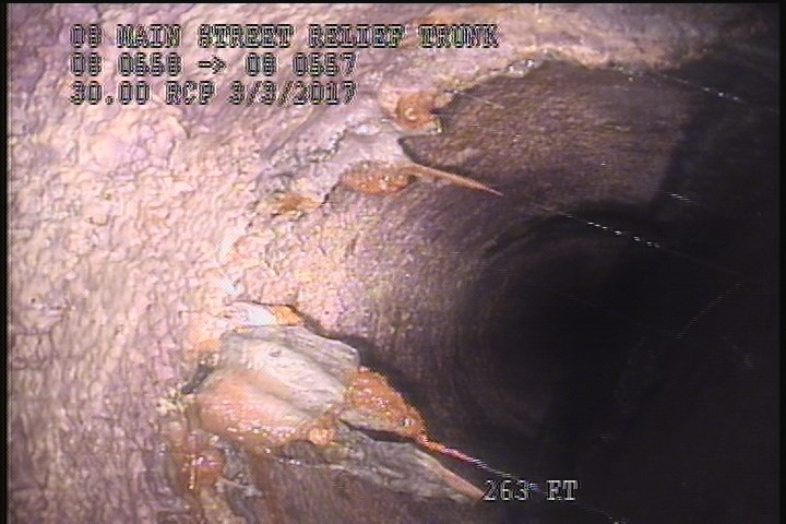 Deposits Attached Encrustation, 20 %of cross sectional area, from 08 to 04 o'clock, , within 8 inches of joint: YES
