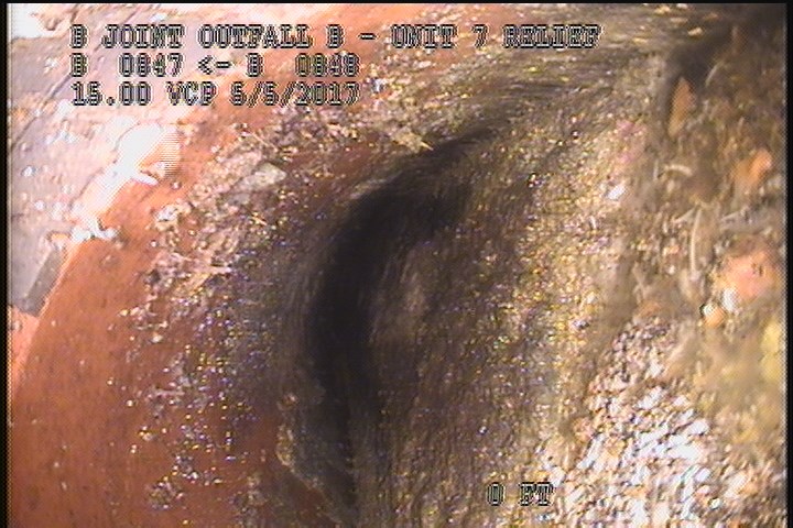 Deposits Attached Grease, 80 %of cross sectional area, from 11 to 01 o'clock, , within 8 inches of joint: NO