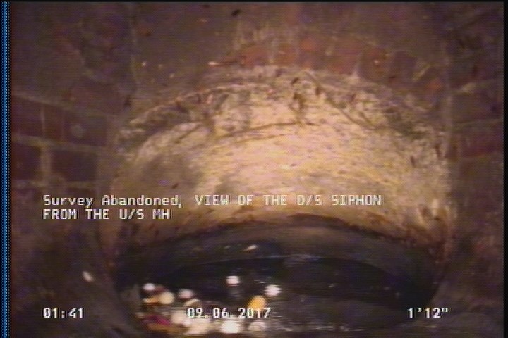 Survey Abandoned - VIEW OF THE D/S SIPHON FROM THE U/S MH