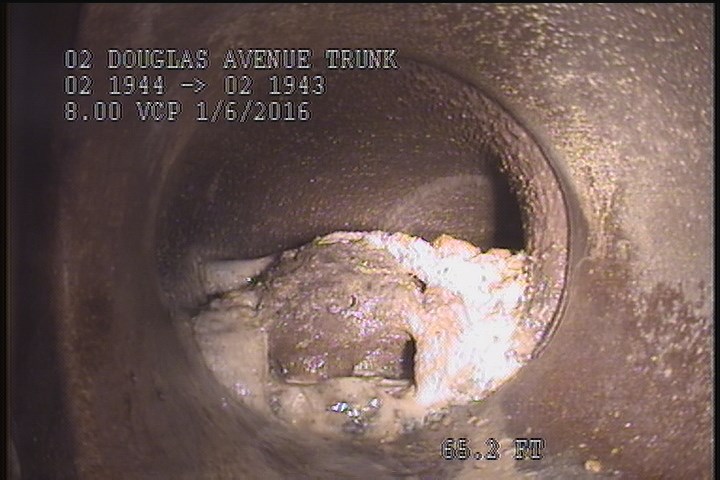Tap Factory Made Defective, at 09 o'clock, -, within 8 inches of joint: YES, 6" - ACTIVE, 45% BLOCKED