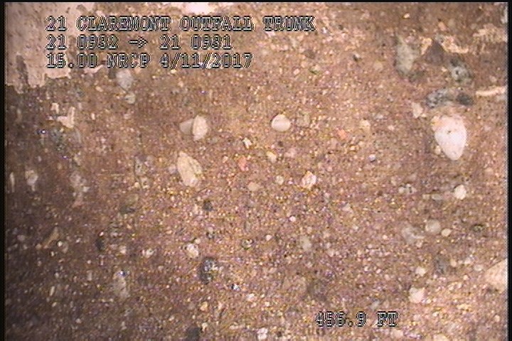 Surface Aggregate Projecting, from 08 to 04 o'clock, within 8 inches of joint: YES - SEVERE AGG