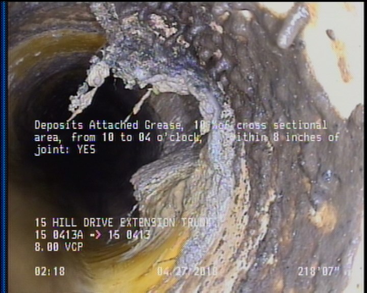 Deposits Attached Grease, 10 %of cross sectional area, from 10 to 04 o'clock, , within 8 inches of joint: YES