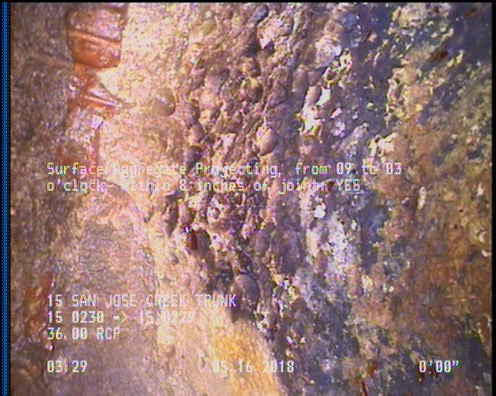 Surface Aggregate Projecting, from 09 to 03 o'clock, within 8 inches of joint: YES