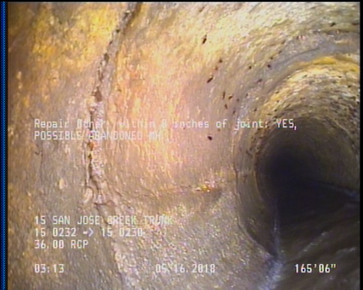 Repair Other, within 8 inches of joint: YES - POSSIBLE ABANDONED MH.,