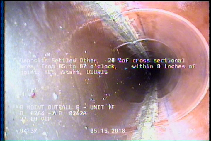 Deposits Settled Other, 20 %of cross sectional area, from 05 to 07 o'clock, , within 8 inches of joint: YES, Start - DEBRIS