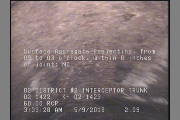 Surface Aggregate Projecting, from 09 to 03 o'clock, within 8 inches of joint: NO