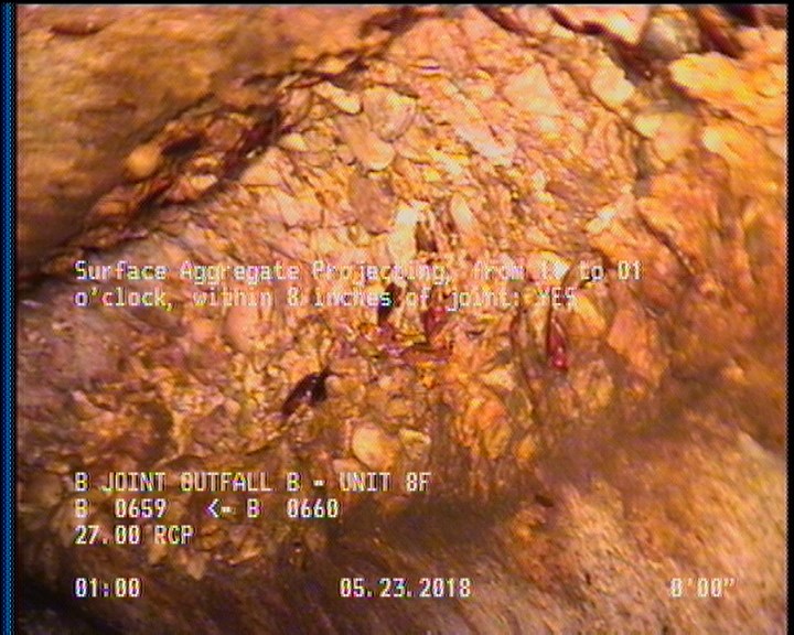 Surface Aggregate Projecting, from 11 to 01 o'clock, within 8 inches of joint: YES