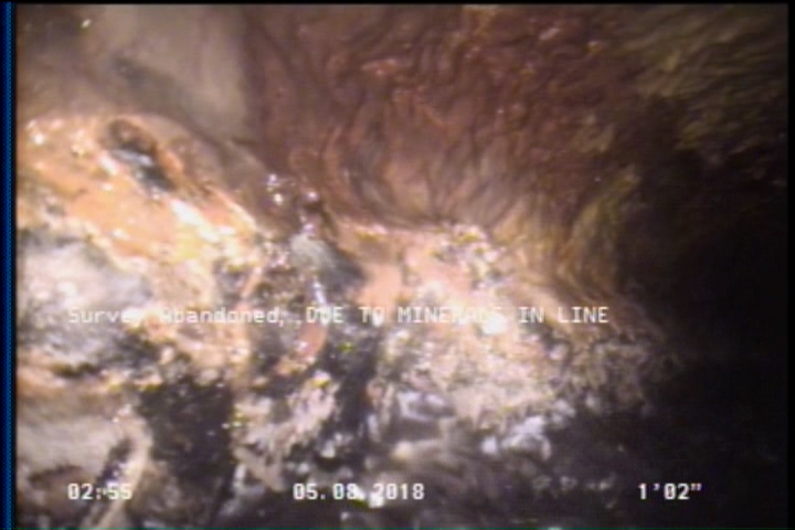 Survey Abandoned - DUE TO MINERALS IN LINE