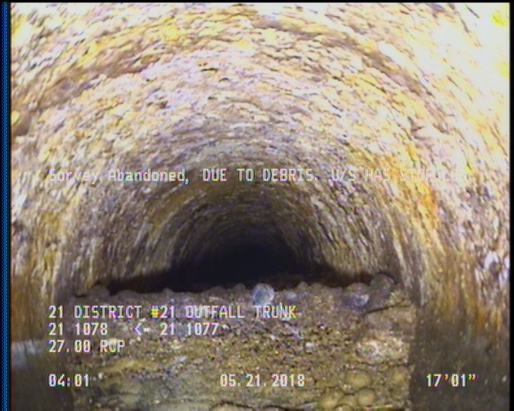 Survey Abandoned - DUE TO DEBRIS. U/S HAS STOP LOG.