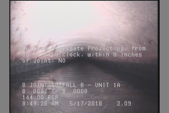 Surface Aggregate Projecting, from 08 to 04 o'clock, within 8 inches of joint: NO