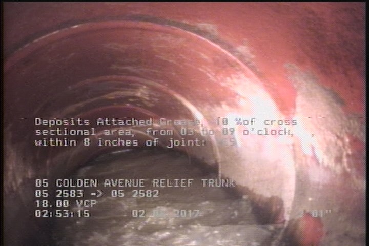 Deposits Attached Grease, 10 %of cross sectional area, from 03 to 09 o'clock, , within 8 inches of joint: YES