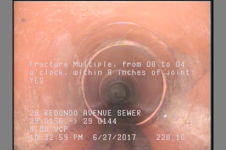 Fracture Multiple, from 08 to 04 o'clock, within 8 inches of joint: YES