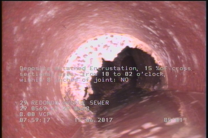 Deposits Attached Encrustation, 15 %of cross sectional area, from 10 to 02 o'clock, , within 8 inches of joint: NO