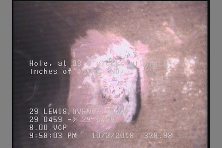 Hole, at 03 o'clock, within 8 inches of joint: NO