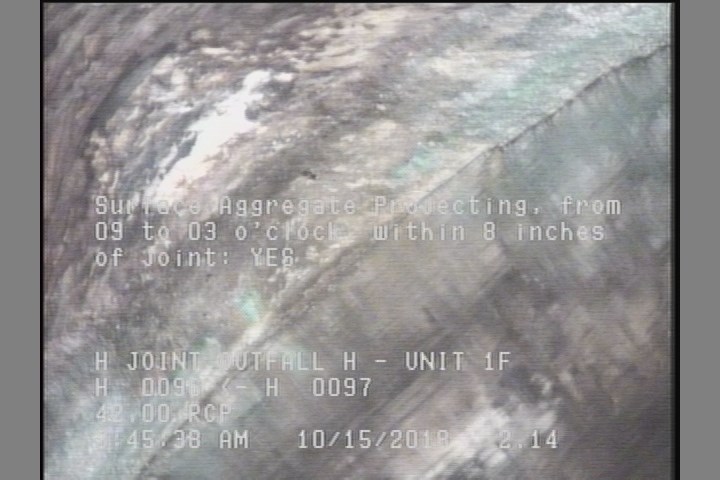 Surface Aggregate Projecting, from 09 to 03 o'clock, within 8 inches of joint: YES