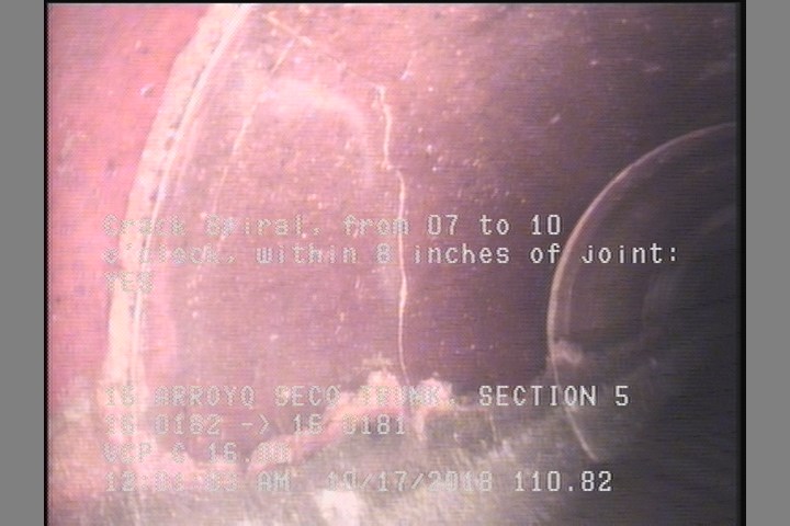 Crack Spiral, from 07 to 10 o'clock, within 8 inches of joint: YES