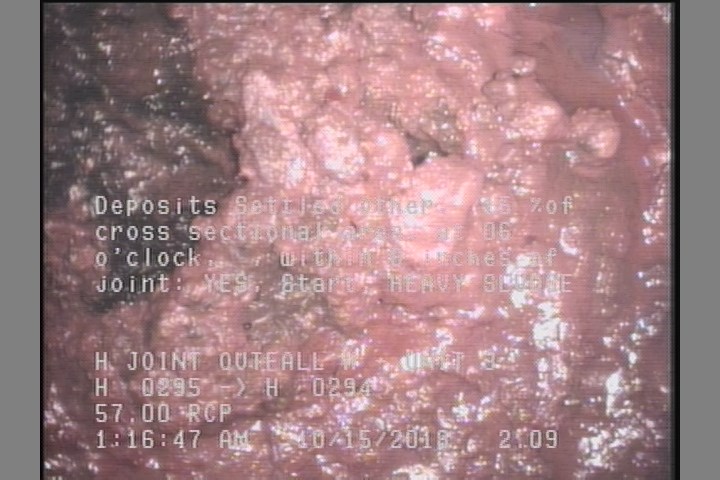 Deposits Settled Other, 15 %of cross sectional area, at 06 o'clock, , within 8 inches of joint: YES, Start - HEAVY SLUDGE