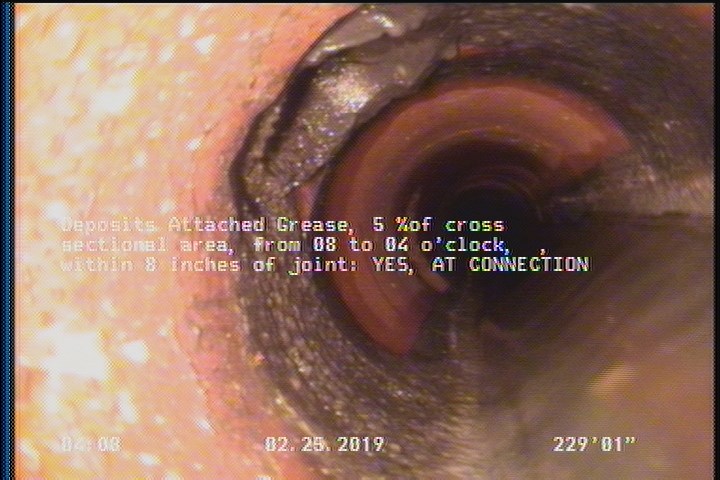 Deposits Attached Grease, 5 %of cross sectional area, from 08 to 04 o'clock, , within 8 inches of joint: YES - AT CONNECTION