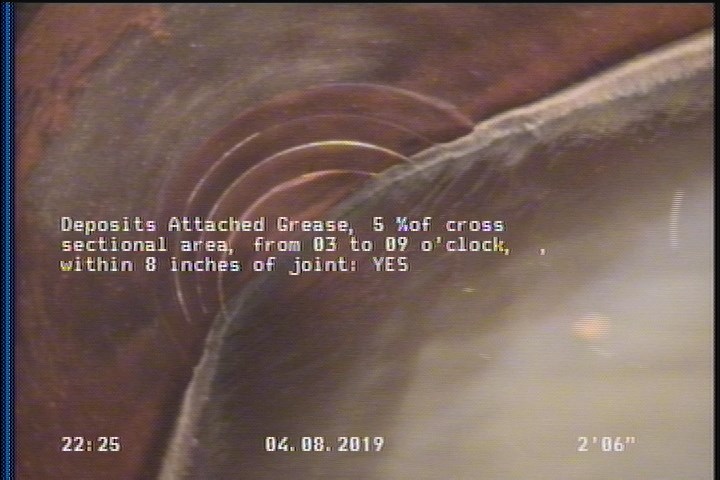 Deposits Attached Grease, 5 %of cross sectional area, from 03 to 09 o'clock, , within 8 inches of joint: YES