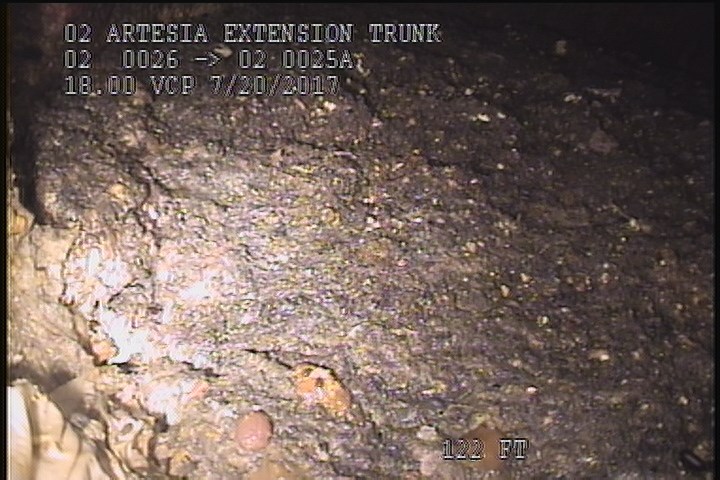 Deposits Ingress Other, 40 %of cross sectional area, from 03 to 09 o'clock, , within 8 inches of joint: NO - DEBRIS