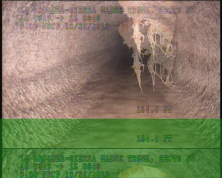 Tap Break-In Intruding, at 02 o'clock, -, -, within 8 inches of joint: NO, 6", 1" - SHREDDED CIPP MATERIAL