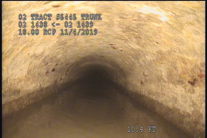 Downstream Manhole, Survey Begins - 11:12 AM