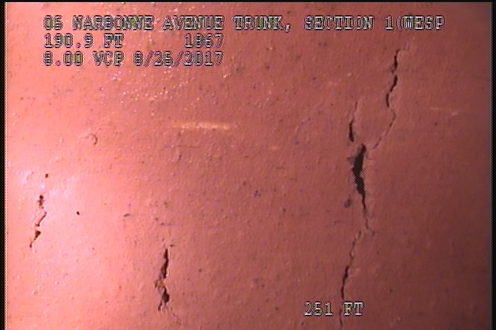 Surface Spalling, from 09 to 11 o'clock, within 8 inches of joint: NO - SURFACE PEELING-POSSIBLE WEAR FROM BEHIND PIPE