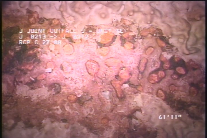 Surface Spalling, from 08 to 04 o'clock, within 8 inches of joint: YES - BIISTERING CONCRETE
