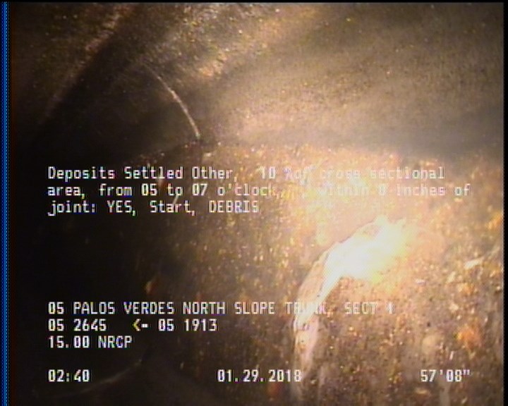 Deposits Settled Other, 10 %of cross sectional area, from 05 to 07 o'clock, , within 8 inches of joint: YES, Start - DEBRIS