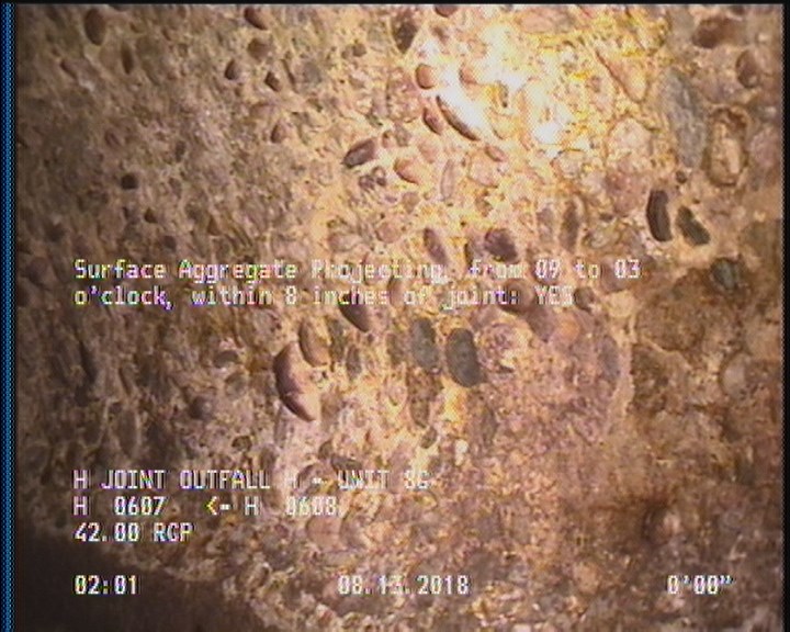 Surface Aggregate Projecting, from 09 to 03 o'clock, within 8 inches of joint: YES