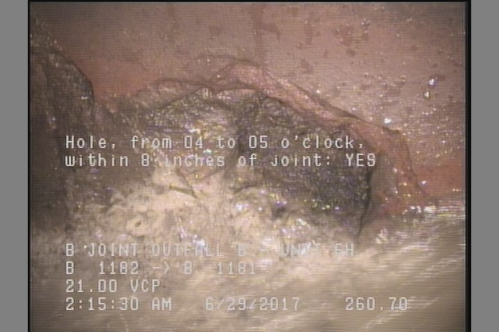 Hole, from 04 to 05 o'clock, within 8 inches of joint: YES