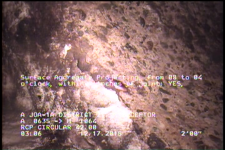 Surface Aggregate Projecting, from 08 to 04 o'clock, within 8 inches of joint: YES