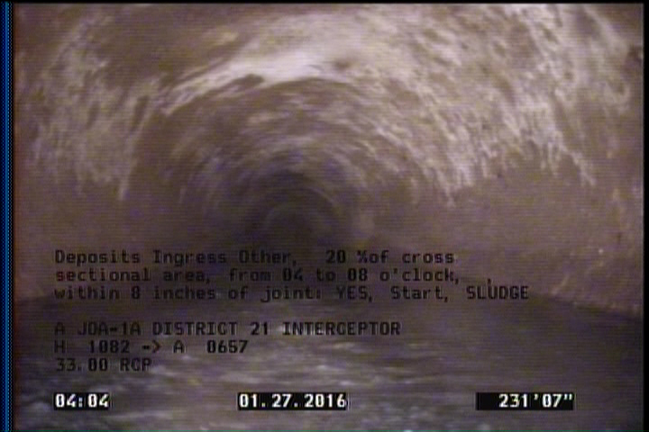 Deposits Ingress Other, 20 %of cross sectional area, from 04 to 08 o'clock, , within 8 inches of joint: YES, Start - SLUDGE