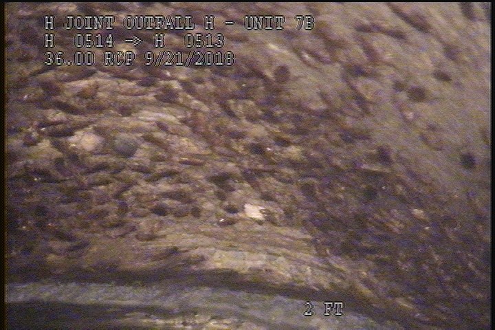 Surface Reinforcement Corroded, from 11 to 01 o'clock, within 8 inches of joint: YES - POSSIBLE REBAR