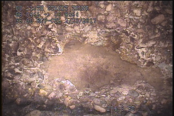 Surface Missing Wall, from 01 to 02 o'clock, within 8 inches of joint: YES - SOIL VISIBLE