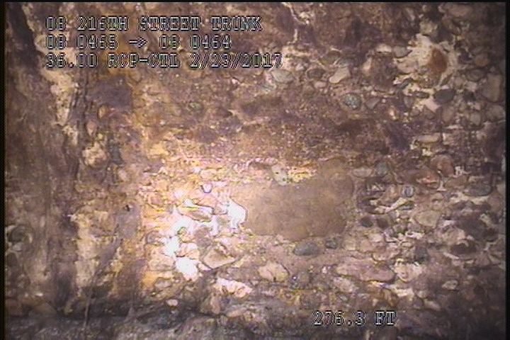 Surface Missing Wall, from 01 to 02 o'clock, within 8 inches of joint: YES - SOIL VISIBLE